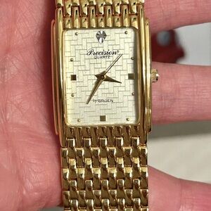Precision by Gruen women’s gold tone watch